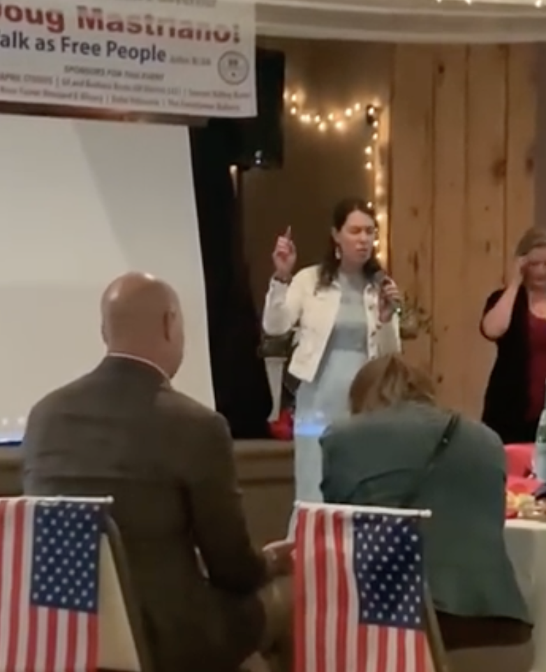 Jane speaking at a community event