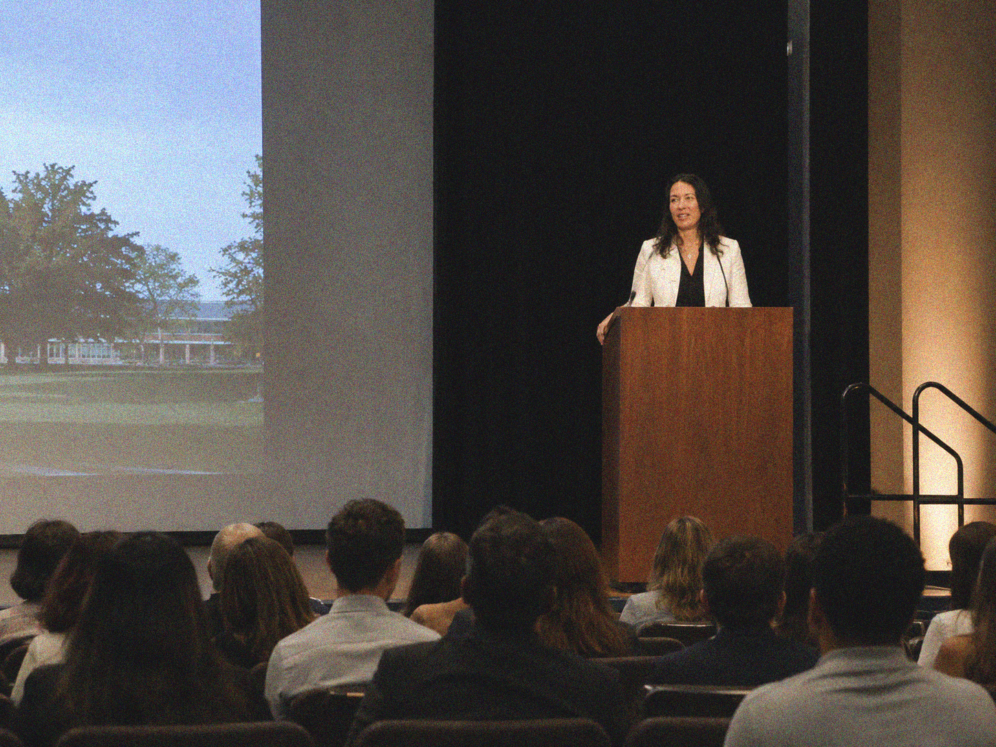 Jane addressing a seated audience